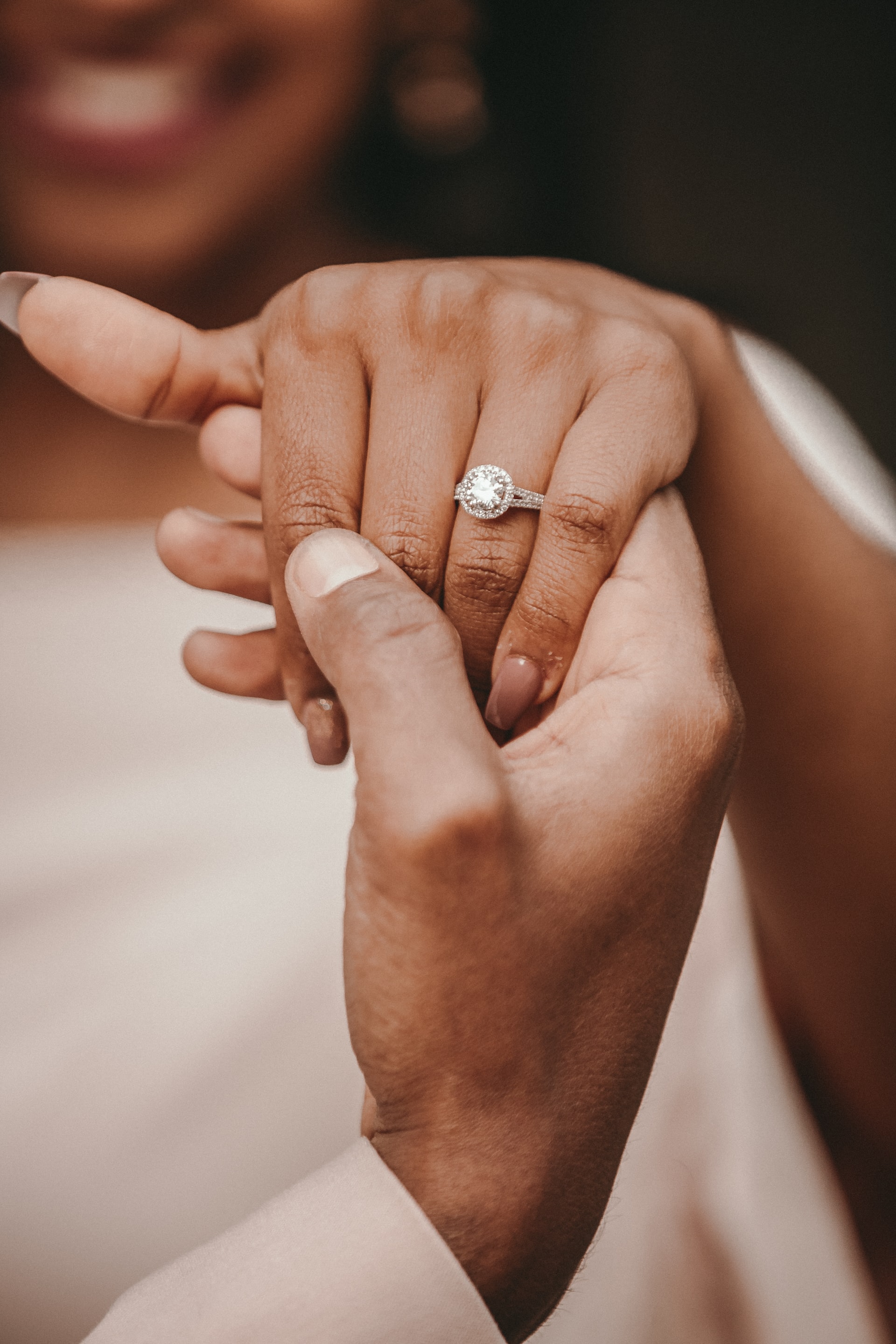 Woman showing a muslim wedding ring