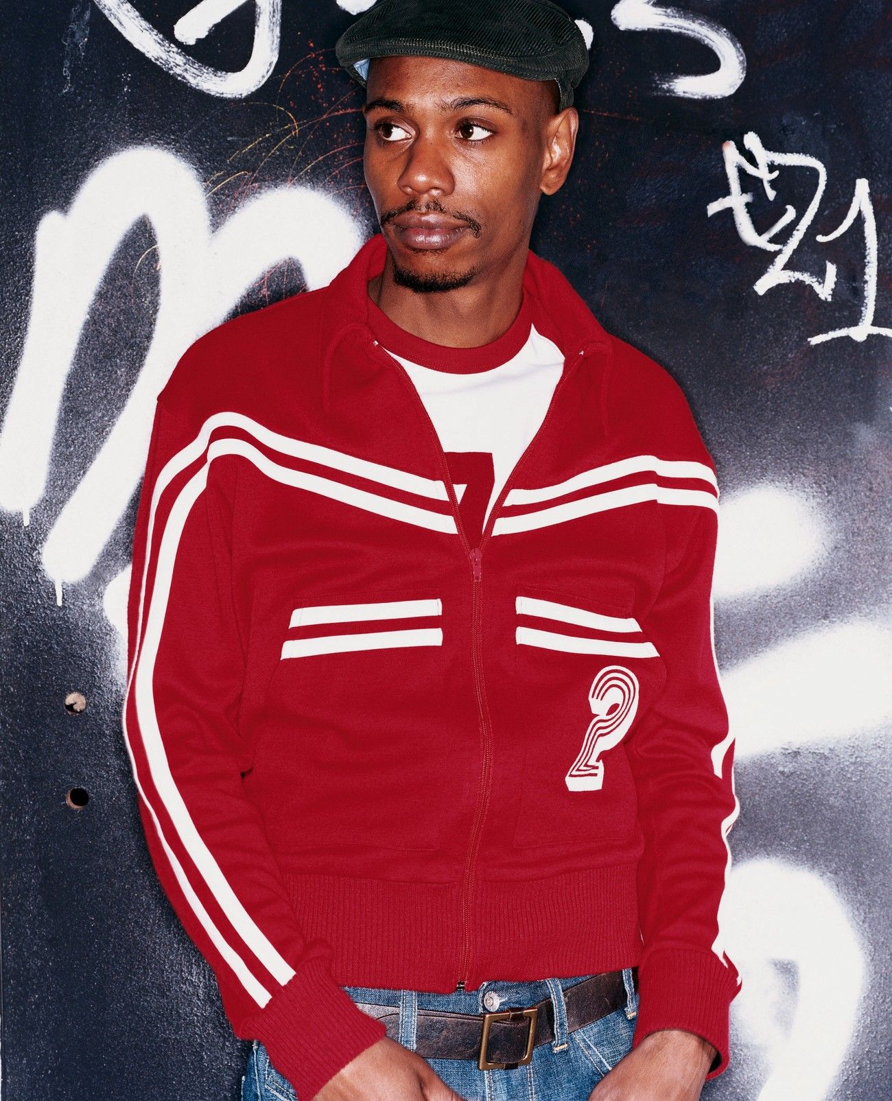Dave chapelle with a red jacket